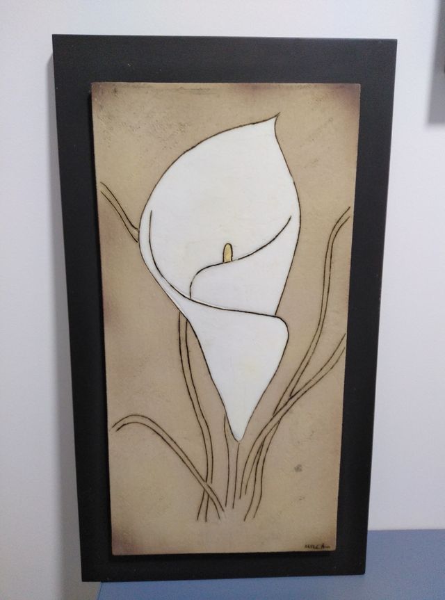 cuadro de piedra con dibujo hecho amano