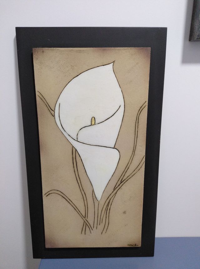 cuadro de piedra con dibujo hecho amano