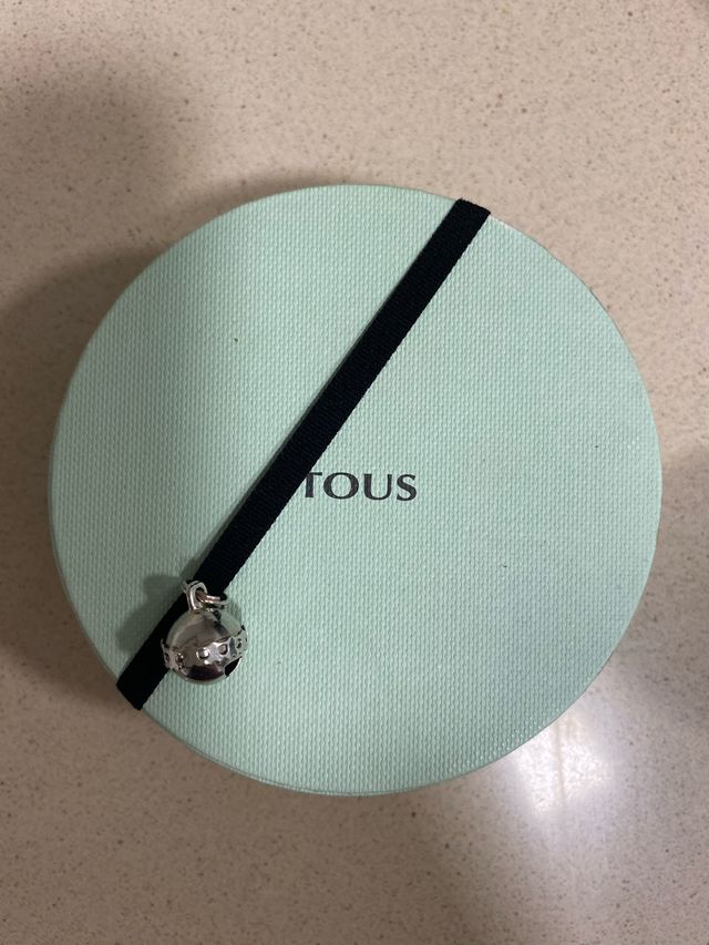 Colgante de flor de tous