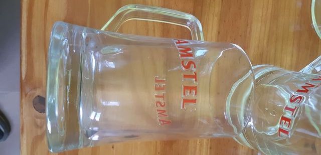 6 JARRAS DE 500 CL. AMSTEL