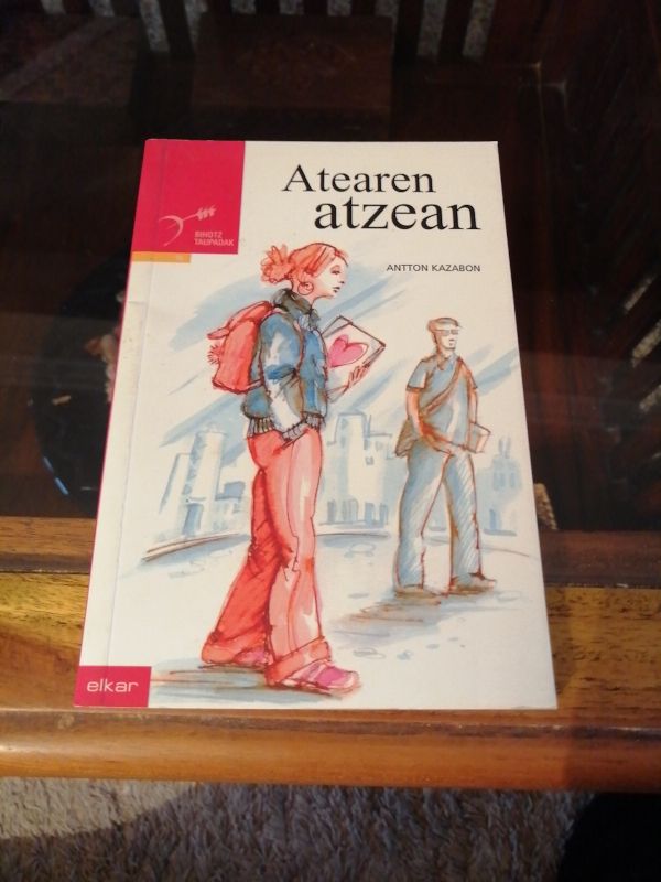 Atearen atzean