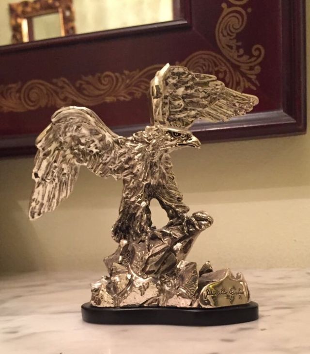 Figura pájaro con laminado de plata