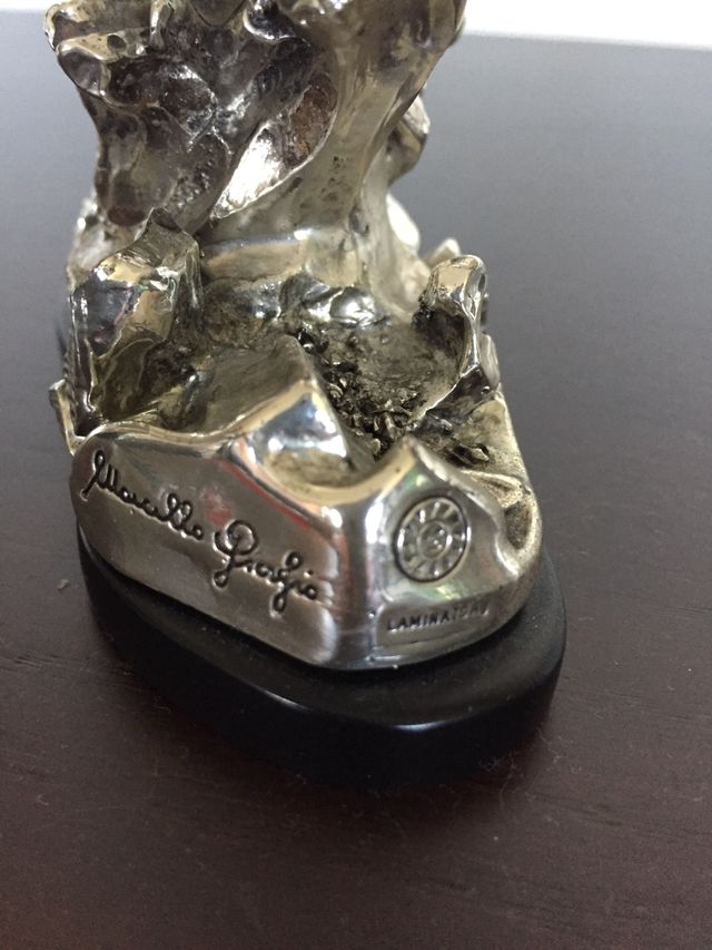 Figura pájaro con laminado de plata