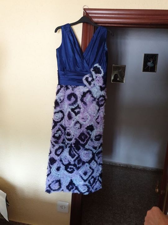 traje nuevo talla 44.