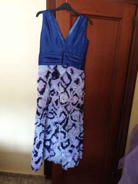 traje nuevo talla 44.