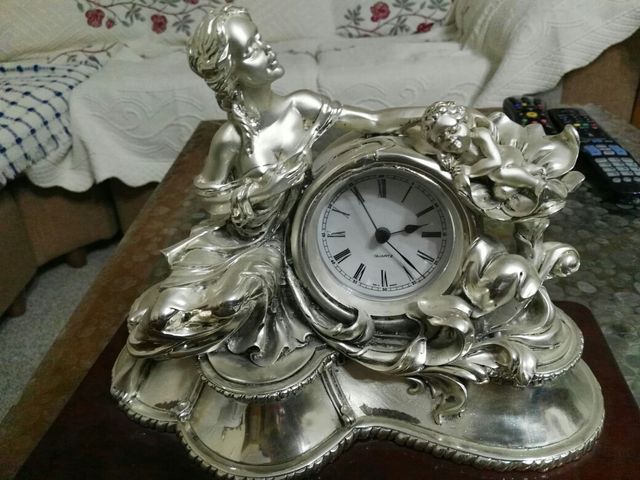 Reloj plata en buen estado