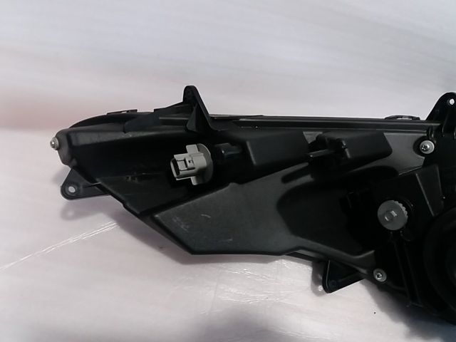 Óptica faro izquierdo Suzuki Burgman 400.