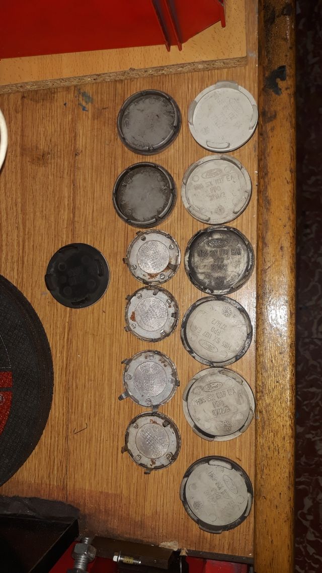 pomo de coche y tapabujes llantas y plafones inter