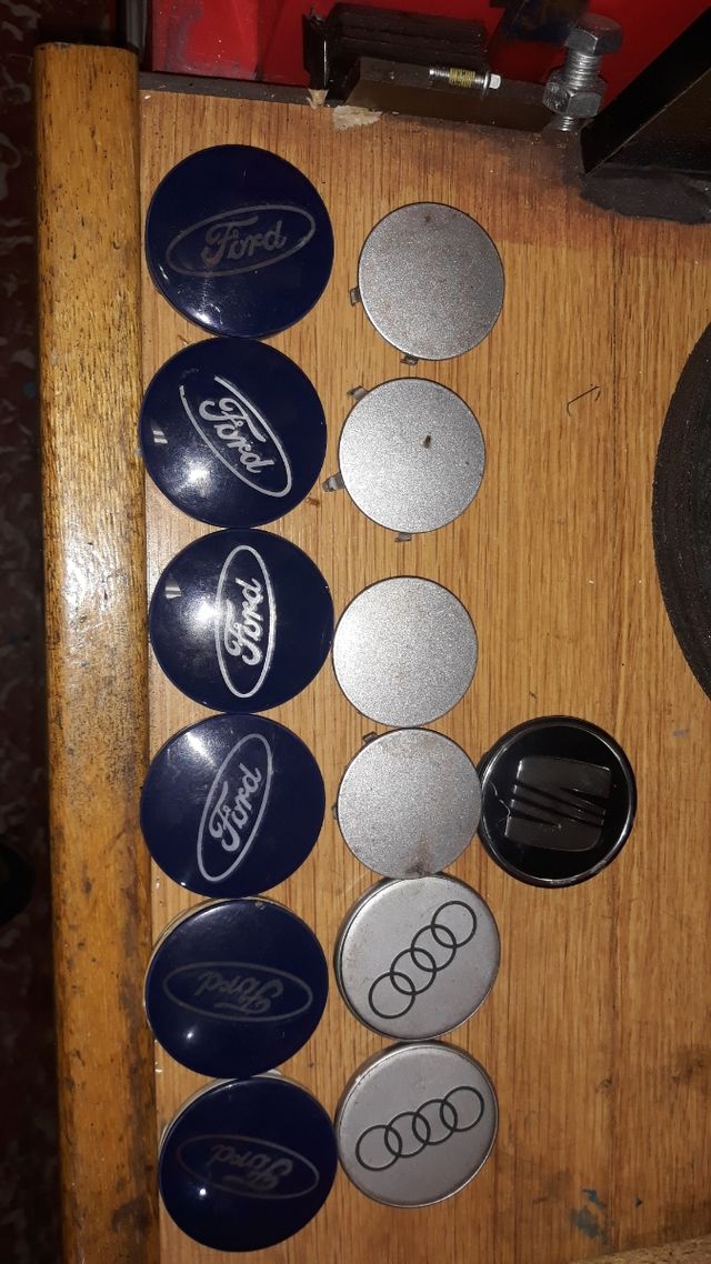 pomo de coche y tapabujes llantas y plafones inter