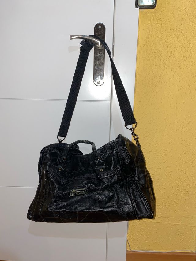 Maleta / bolsa de piel