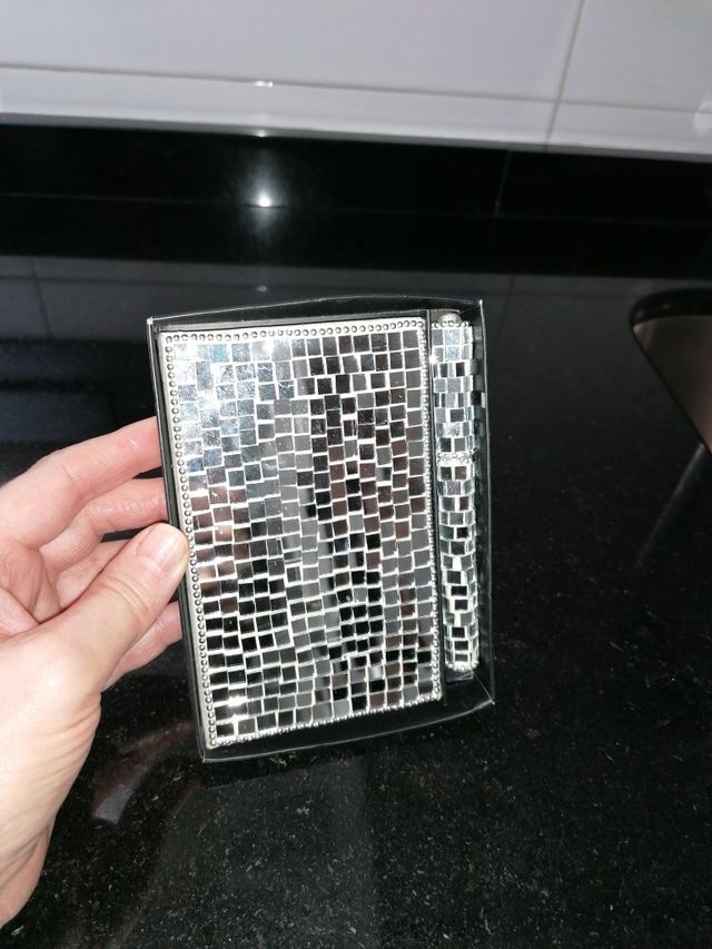 Conjunto de cuaderno, boli y apagavelas espejados