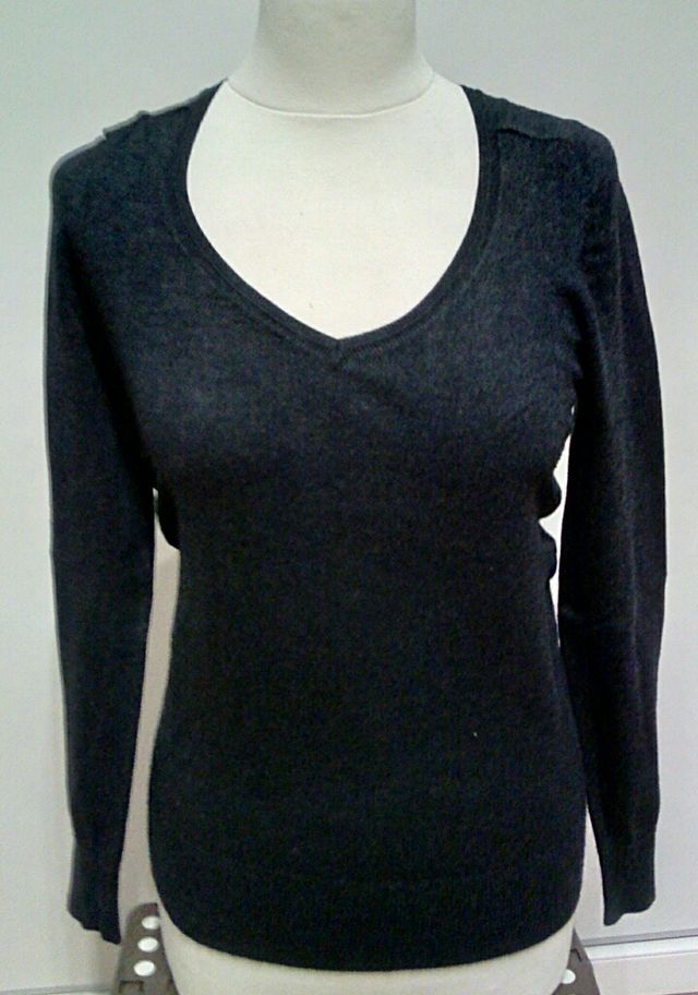 Jersey talla S/M y pañuelo.