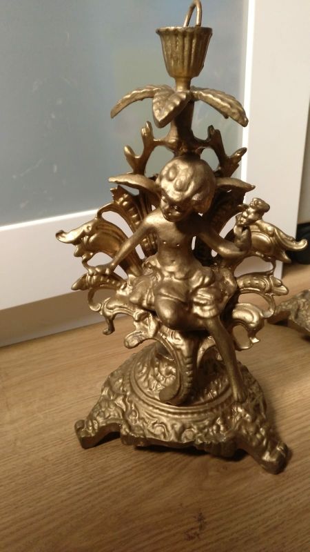 candelabros antiguos y reloj