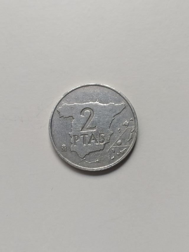 2 pesetas