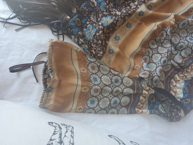 Precioso vestido .No arruga.Impresionante tejido