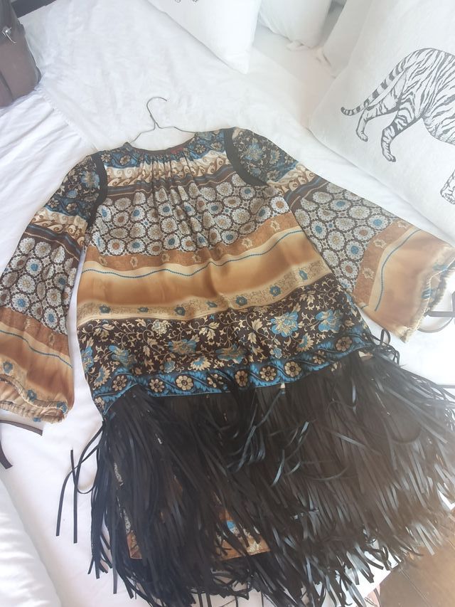 Precioso vestido .No arruga.Impresionante tejido