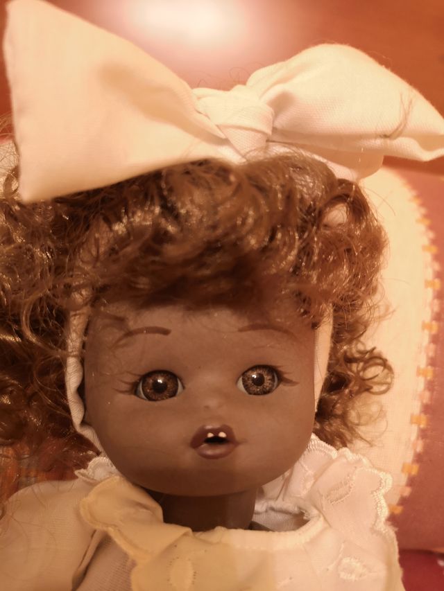 Muñeca de porcelana articulable