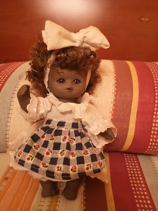 Muñeca de porcelana articulable