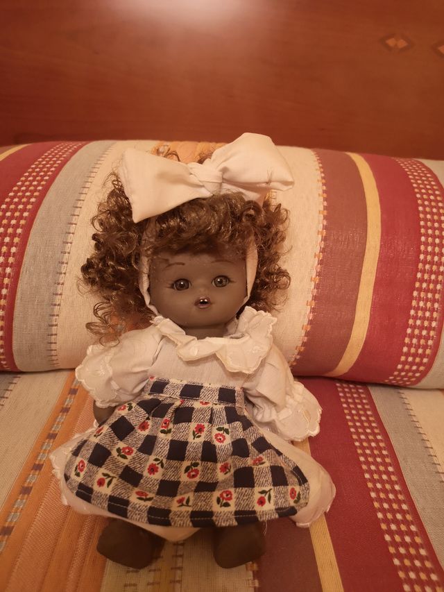 Muñeca de porcelana articulable