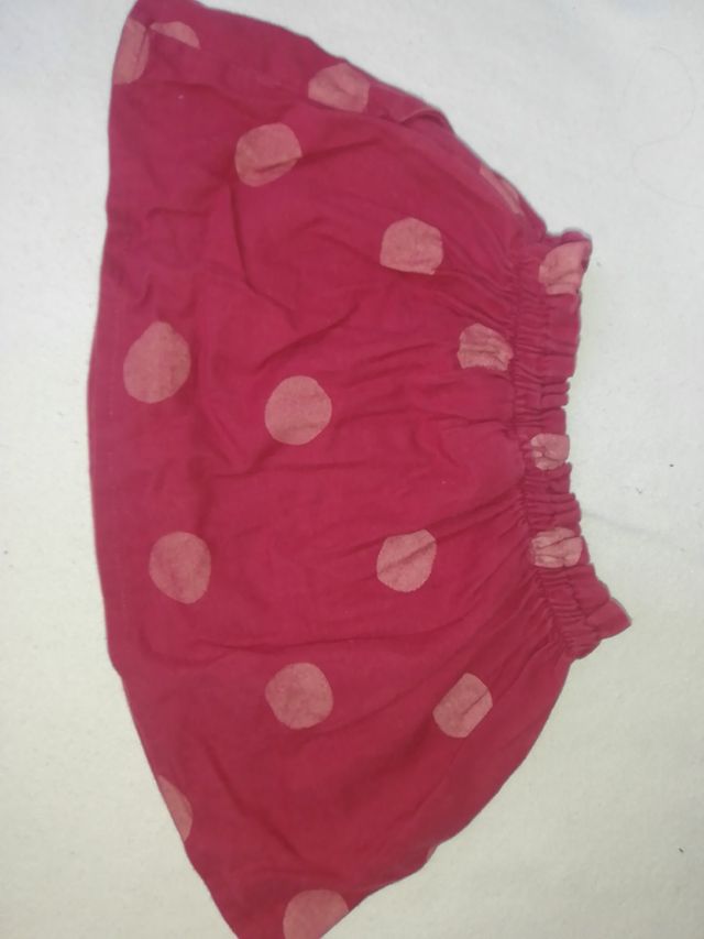 Falda granate (Zara) T. 3-4.