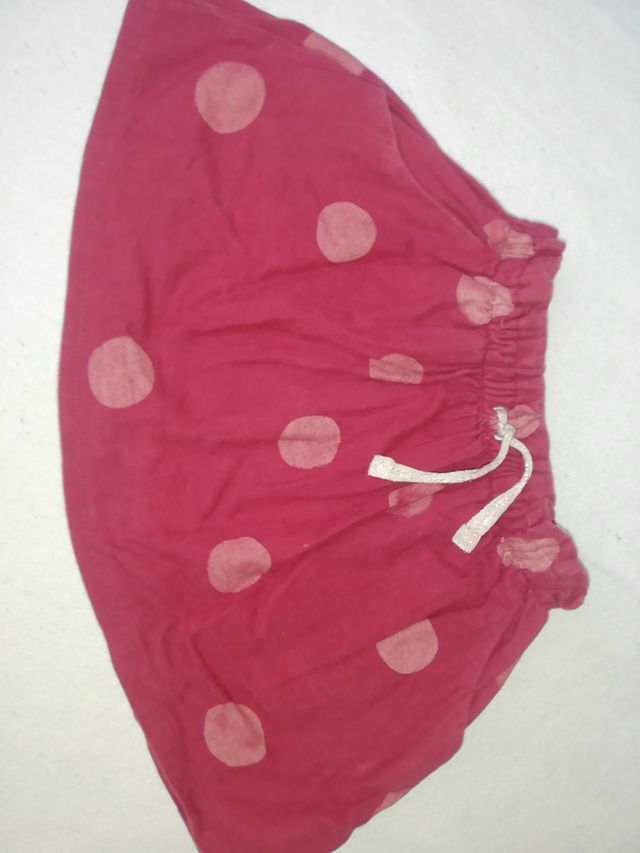Falda granate (Zara) T. 3-4.