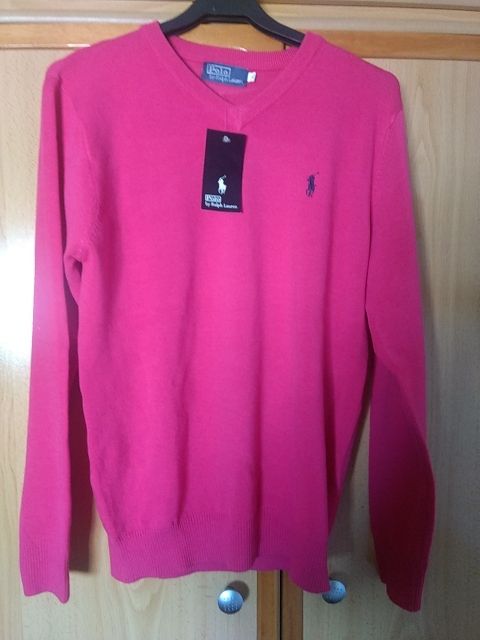 Suéter color fucsia o rosa