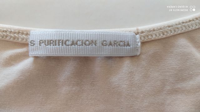 Purificación García. Camiseta. sra. 