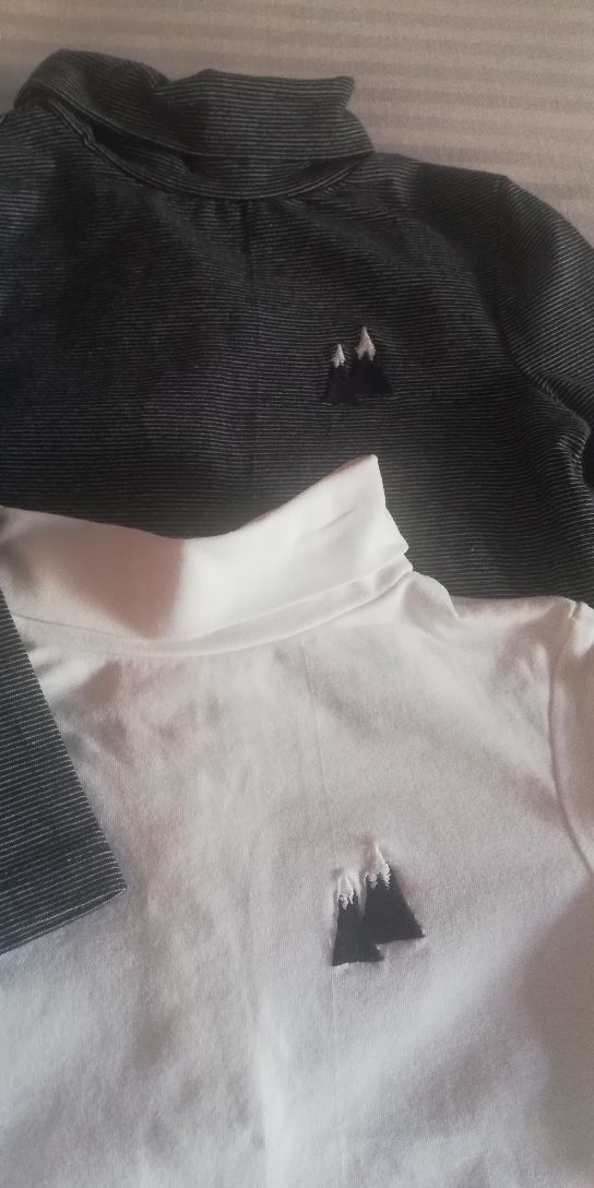 2 Jerseys 6/9 meses.