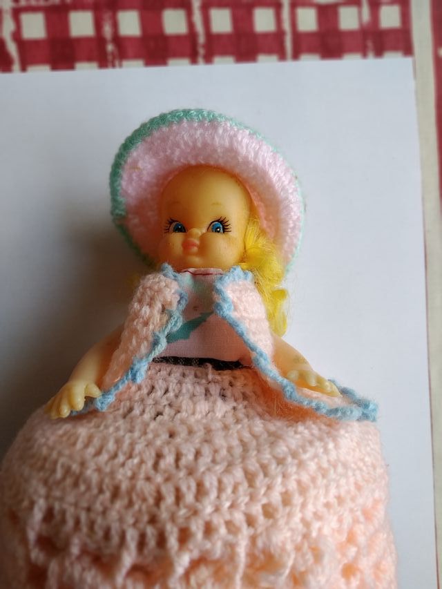 MUÑECA CUBRE PAPEL