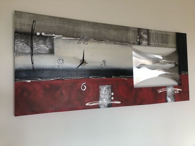 #Lienzo en 3D con reloj Cuadro