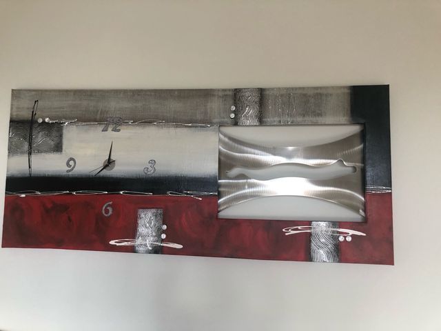 #Lienzo en 3D con reloj Cuadro