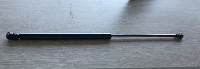 Muelle hidráulico para maletero