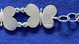 Conjunto Tous forma de mariposa