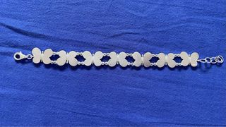 Conjunto Tous forma de mariposa