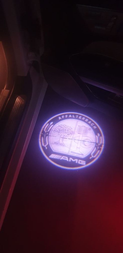 Luz logo Puerta Mercedes AMG W212 CLA CLS w211