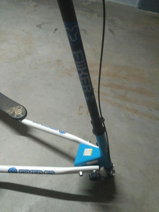 monopatín tres ruedas