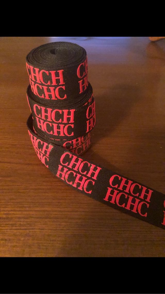 Bolsas Carolina Herrera más cuatro rollos de cinta