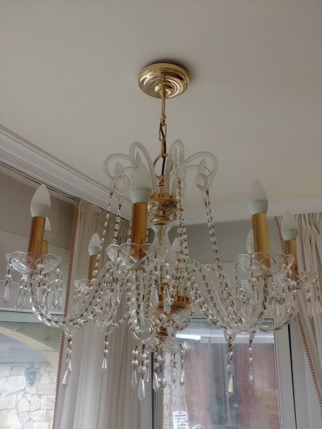 Lámpara de araña de cristal de roca pulida