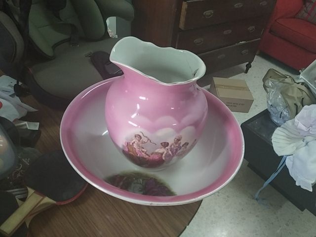 Conjunto antiguo de jarro de agua más lava cara