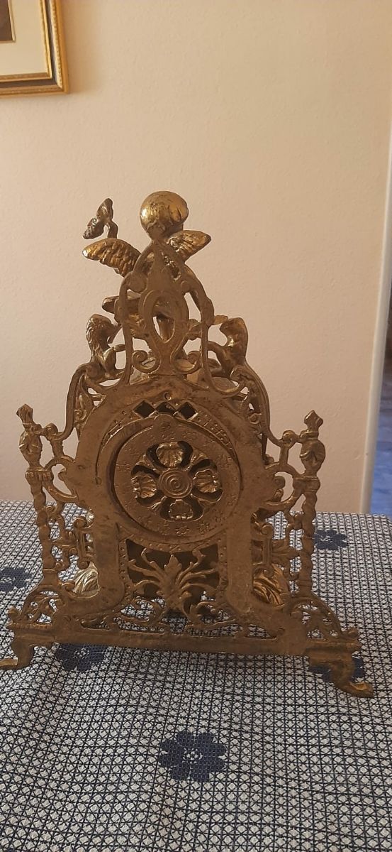 Reloj y candelabros bronce