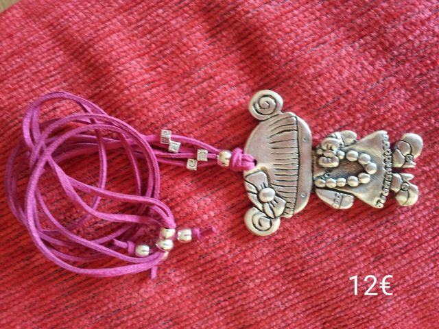 Colgante muñeca zamak