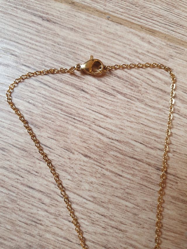 Colgante inicial "E"