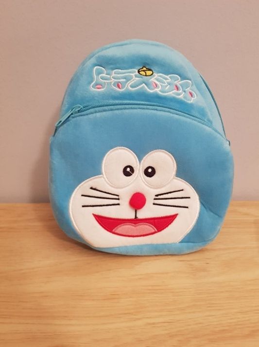 Original pequeña mochila peluche de Doraemon,azul.
