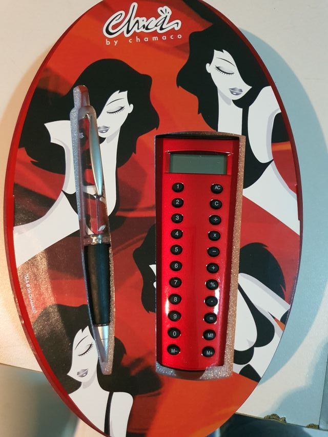 set boligrafo y calculadora