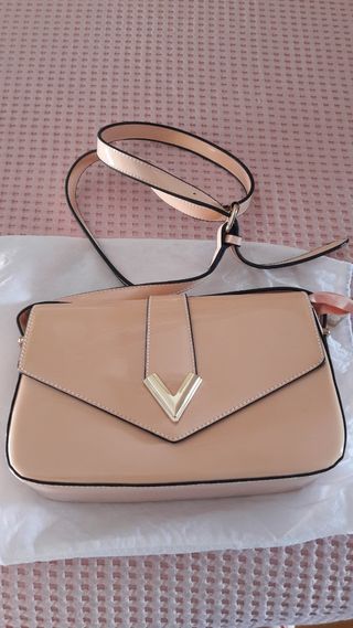 Bolso color maquillaje de segunda mano por 2 EUR en Mendibile en WALLAPOP