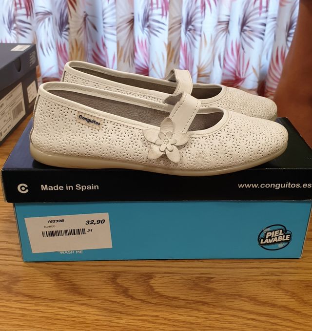 Zapatos conguitos ceremonia celebracion niña