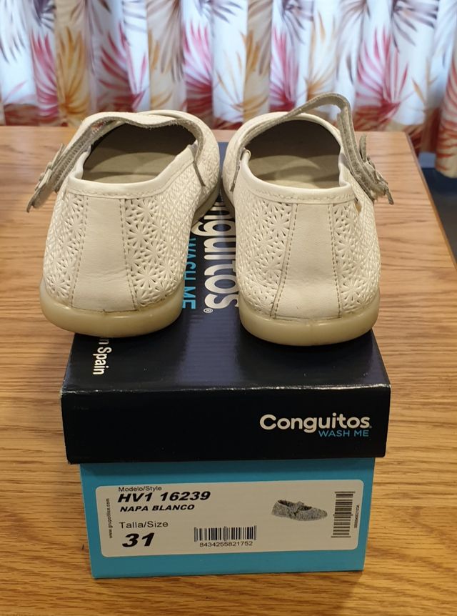 Zapatos conguitos ceremonia celebracion niña