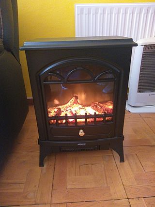 Calefactor chimenea de segunda mano por 85 € en Oviedo en WALLAPOP