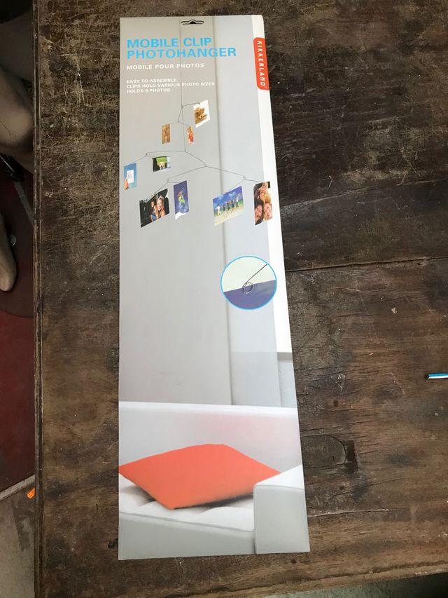 Móvil para fotos o postales Kikkerland