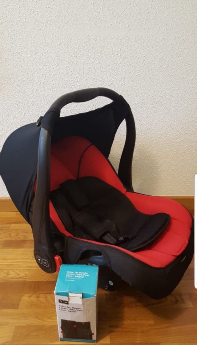 Carro, grupo cero y silla.